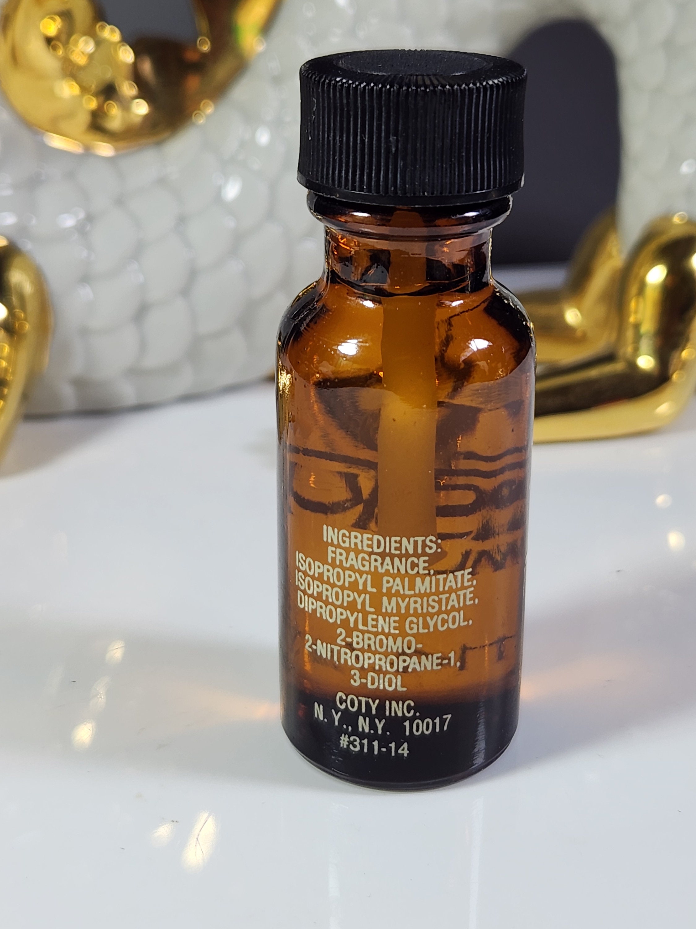 Coty wild musk online oil for sale