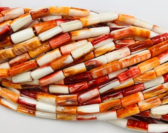 Wampum Shell and Orange Spiny Oyster Shell 4 Tier Memory Wrap Bracelet Wampum Shell and Orange Spiny Oyster Shell 4 Tier Memory Wrap Bracelet