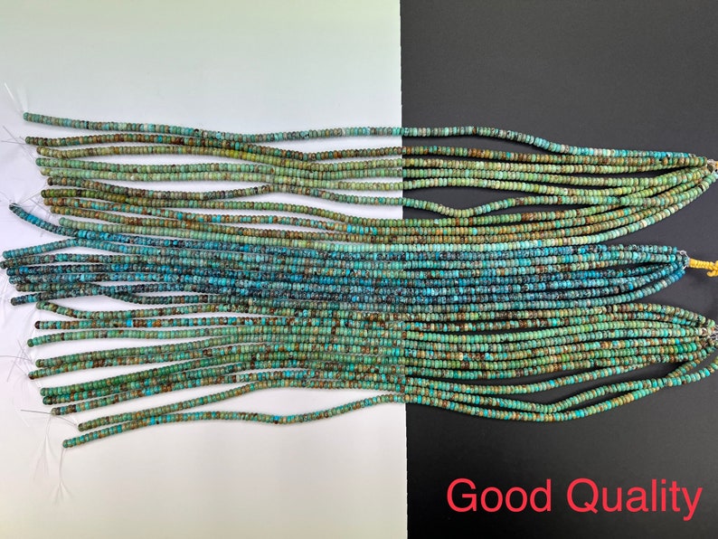 K&ouml;nnte beinhalten: Mehrere Str&auml;nge t&uuml;rkisfarbener Perlen, jede in Form einer kleinen Scheibe. Die Perlen zeigen verschiedene Blau- und Gr&uuml;nt&ouml;ne, mit einigen Braun- und Schwarzt&ouml;nen. Das Bild enth&auml;lt den Text "Good Quality" in Rot.