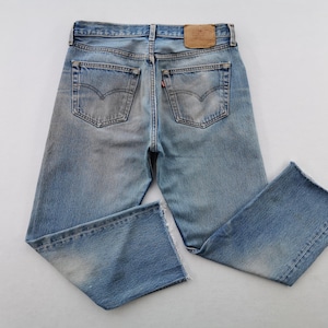 Calça Jeans Levis Desgastada Vintage Anos 90 Levis Lote 501 Calça Jeans Denim Fabricada nos EUA Tamanho 33