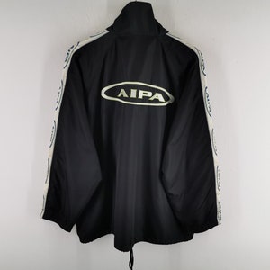 Aipa Jacket Distressed Vintage 90s Aipa Surfboard Taped Logo Windbreaker Jacket Size L