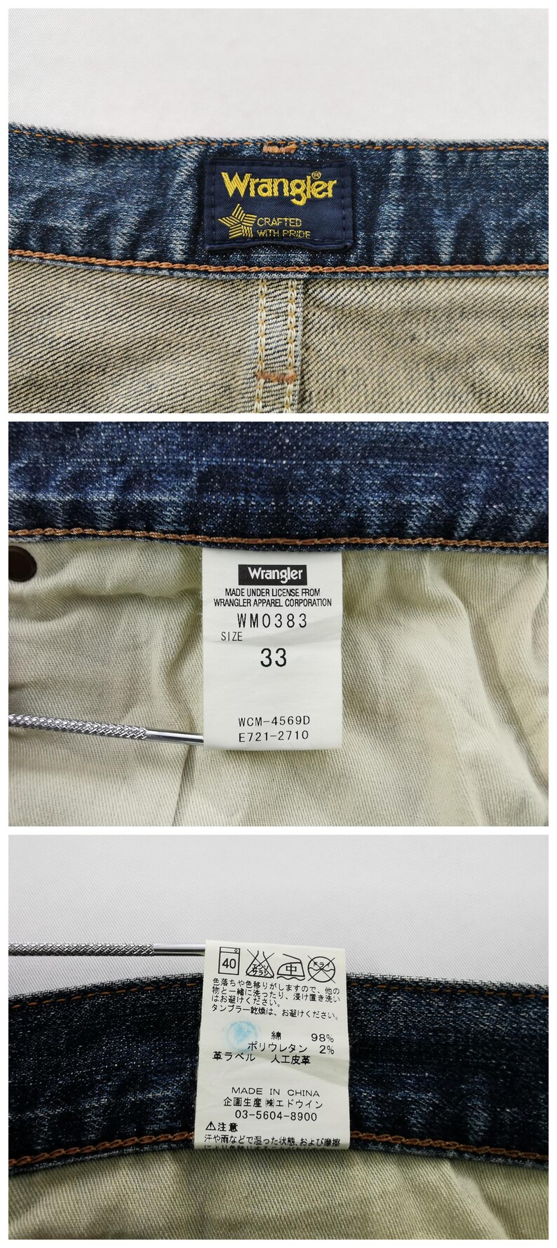 May include: Close-up of denim jeans with a Wrangler label. The label reads "CRAFTED WITH PRIDE". The size tag indicates a size 33. The care label shows washing instructions and fabric composition: 98% cotton, 2% polyurethane.