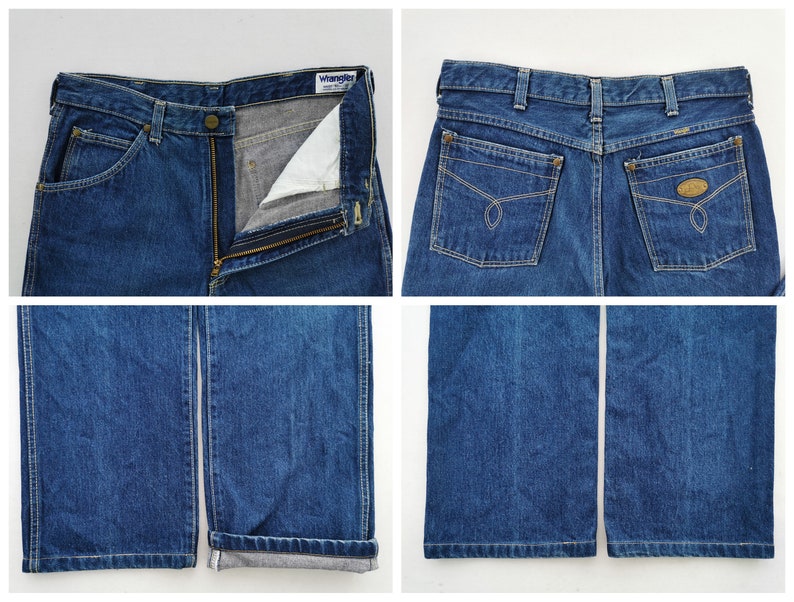May include: Blue denim jeans with a zipper fly and a button closure. The jeans have front and back pockets, and the brand "Wrangler" is visible on the label. The jeans have a straight leg and are cuffed at the bottom.
