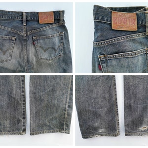 May include: Four-panel image of faded blue denim jeans. The jeans have a classic five-pocket design, with a leather patch on the back waistband. The jeans show signs of wear and tear, with some fading and distressing.
