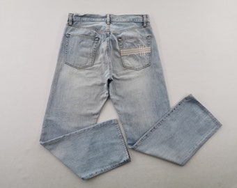 Vaqueros desgastados Burberry Vaqueros vintage Burberry fabricados en Japón Talla 33