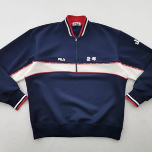 May include: A set of three ceramic mugs with a speckled, matte finish. The mugs are in shades of cream, light brown, and dark brown. Each mug has a simple, minimalist design, perfect for coffee or tea.