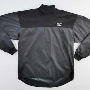 May include: A set of three ceramic mugs with a speckled, matte finish. The mugs are in shades of cream, light gray, and dark gray. Each mug has a simple, modern design and a rounded handle. Perfect for coffee or tea.