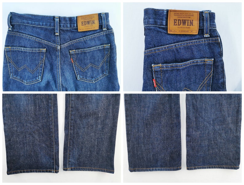 May include: Dark blue denim jeans with a classic five-pocket design. Features include a leather patch with "EDWIN" branding and a red logo tab. The jeans have a straight leg cut and are made of a durable denim fabric.