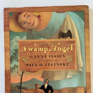 May include: A children's book cover titled "Swamp Angel" by Anne Isaacs, illustrated by Paul O. Zelinsky. The illustration features a giant woman holding a sign with the title, an eagle, and a couple in the foreground. The color palette includes blues, greens, and browns.