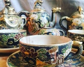 Japanese tea service Satsuma from the early 20th century. 13 pieces. Polychrome enamels.