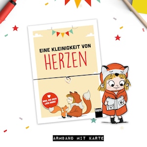 May include: A card with a fox illustration and the text "EINE KLEINIGKEIT VON HERZEN" and "WEIL ICH DICH LIEB HABE!"  The card also says "ARMBAND MIT KARTE" and has a fox illustration with a heart.