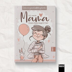 May include: A hardcover journal with the title "Ich werde Mama" (I'm going to be a Mom) and the subtitle "Unsere Reise beginnt hier!" (Our journey begins here!). The cover features an illustration of a smiling woman, a pink balloon, and a small bunny.