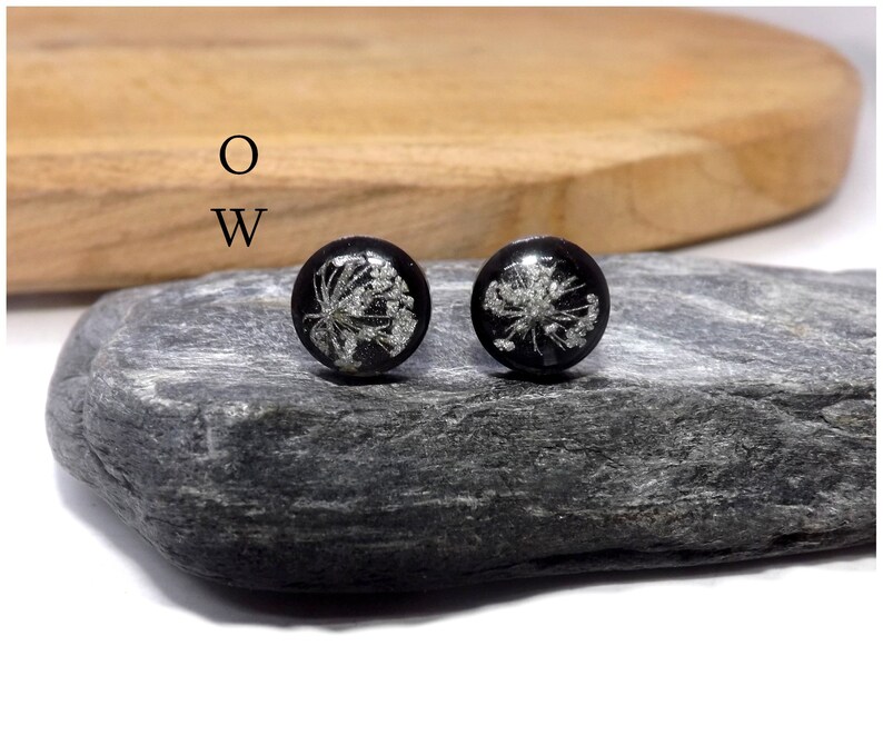 Black stainless steel nails made of a wild carrot flower