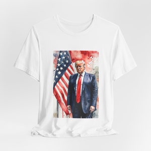 Patriotic Trump T-Shirt with American Flag Background, Political Statement Tee, USA Apparel Unisex Jersey Short Sleeve, Gift for Trump Fan