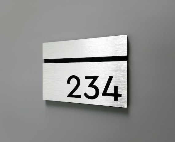 Brushed aluminum custom numbers. Silver hotel room numbers. Custom apartment number signs. Door numbers. Modern room number plaques.