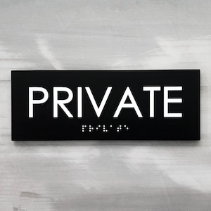 Private ADA compliant door sign. Custom ADA signs. Private entry signs. Tactile text and Grade 2 Braille room identification sign.