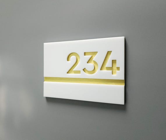 White apartment number signs. Hotel room numbers. Personalized address plaques. Interior door numbers. Office and exam room signage.
