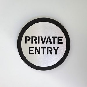 Private entry sign. Private sign. Staff only. Employees only. Business signage.