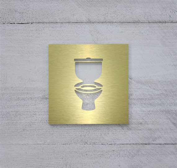 Toilet symbol sign. Square bathroom sign. Restroom signs with toilet symbol. Gold. Silver. White. Black.