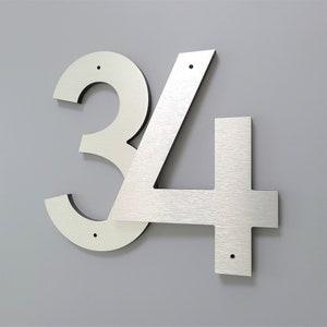 12 inch modern numbers and letters. Black, White and Silver house numbers. Bold door numbers. Building numbers.