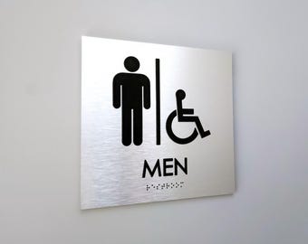 Accessible men restroom sign. Handicap accessible men's bathroom. ADA compliant bathroom signs. Tactile Braille signs.