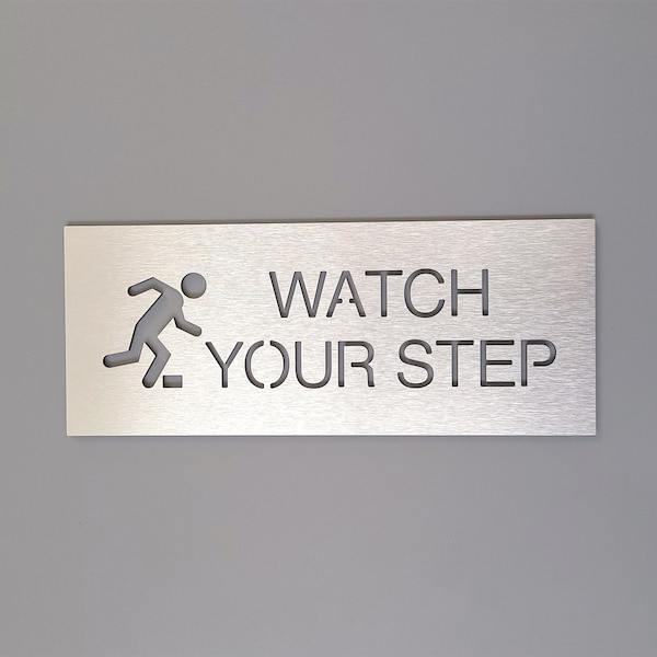 Watch your step sign. Caution watch your step. Caution sign with graphic. Safety business signage.