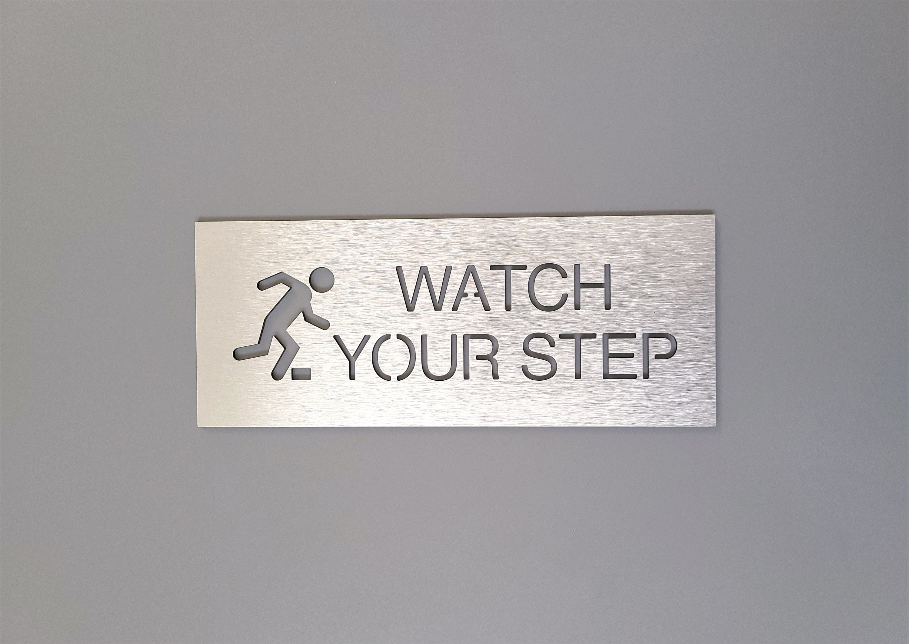 watch-your-step-sign-caution-watch-your-step-caution-sign-with
