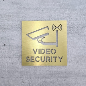 Video surveillance sign. Video security. Security cameras in use sign. Surveillance camera signs.