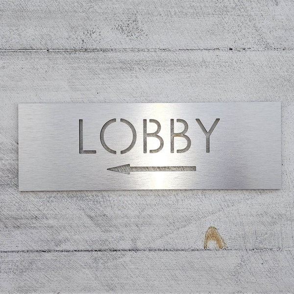 Lobby sign with arrow. Arrow signs. Directional lobby sign. Information signs for business. Wayfinding sign.