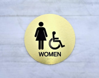 ADA Women restroom sign. Handicap accessible women's bathroom. ADA compliant bathroom signs. Tactile Braille signs.