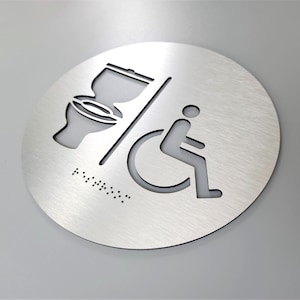 Add Grade 2 Braille writing to any of our restroom signs. Braille signs. ADA signs.