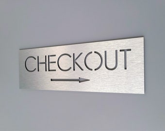 Kassenschild mit Pfeil. Pfeil Zeichen. Richtungsweisendes Kassenschild. Hinweisschilder für Geschäft. Wegweiser Schild.