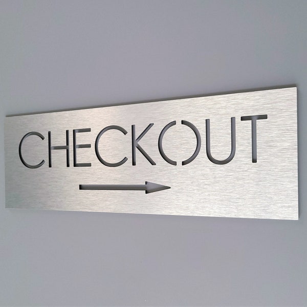 Checkout sign with arrow. Arrow signs. Directional checkout sign. Information signs for business. Wayfinding sign.