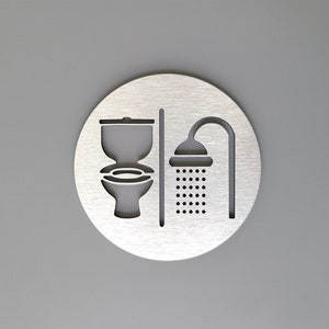 Letrero de baño y ducha con símbolos. Letrero de puerta para cuarto de baño. Señalización de baños. Señalización de baños.