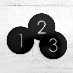 Round number plaque. Exam room numbers. Door number sign. Apartment number. Hotel room numbers. Black