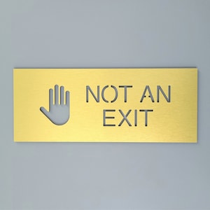 Not an exit sign. Stop do not exit sign. No exit door signs. Business signage.