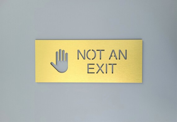 Not an exit sign. Stop do not exit sign. No exit door signs. Business signage.