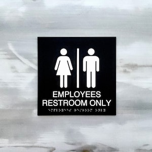 Employees' restroom only sign. ADA compliant bathroom signs. Employees only restroom. Staff only bathroom. ADA signage.