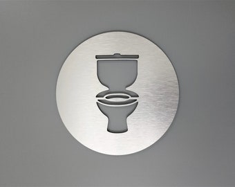 Aluminum toilet symbol sign. Bathroom sign. Restroom signage.