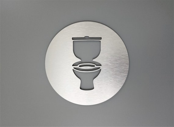 Aluminum toilet symbol sign. Bathroom sign. Restroom signage.