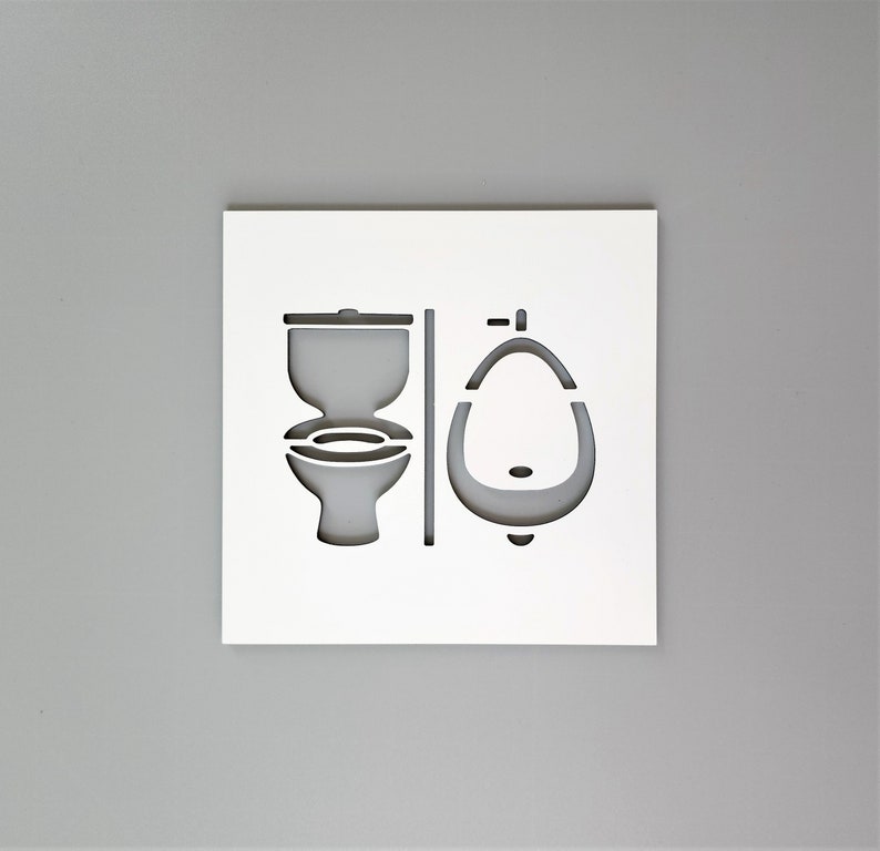 Bathroom sign with toilet and urinal symbols. All gender restroom signs. Unisex toilet sign. Gender neutral restroom door signs. Biały