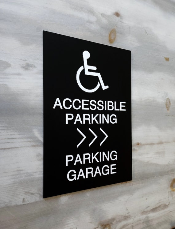 Accessible parking directional sign. Handicapped parking garage sign. Handicap parking signs. Wayfinding signs.