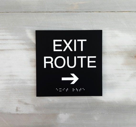 Exit route ADA compliant sign. Exit route signs with Grade 2 Braille and Tactile text. ADA compliant Exit signage.