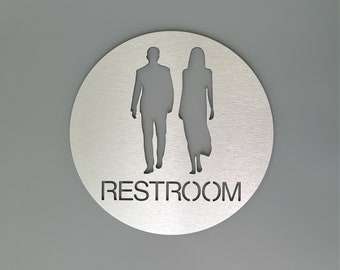 Modern male/female restroom sign. Bathroom sign. Silver. Gold. Unisex toilet. All gender restroom.