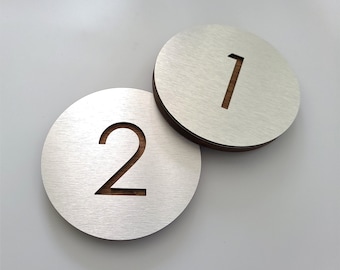 Apartment numbers. Silver house number plaque. Door numbers. Hotel room numbers. Exam room number.