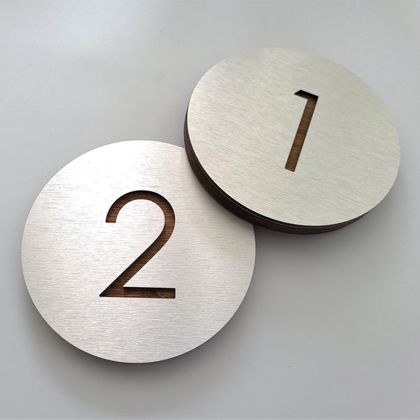 Apartment numbers. Silver house number plaque. Door numbers. Hotel room numbers. Exam room number.