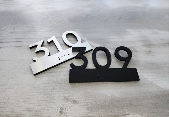 Room number signs with Grade 2 Braille. Custom door numbers with Braille. Apartment number plaques. Hotel room numbers. Braille signs.