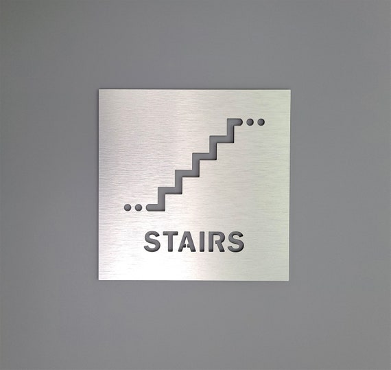 Stairs sign. Stairway sign. Stairwell exit. Warning and caution signs. Safety signage. Directional signs for business.