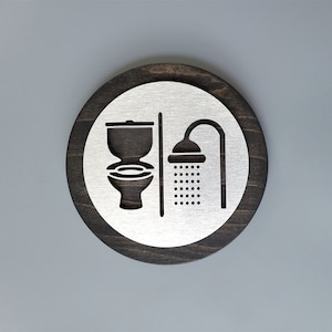 Toilet and shower room door sign. Restroom and shower symbols. Bathroom signs.