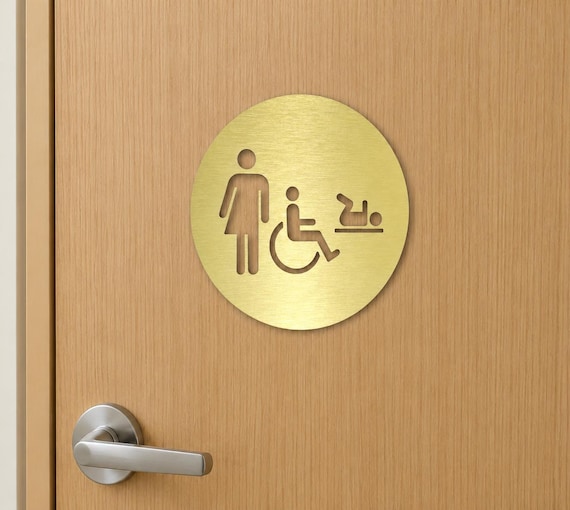 Family restroom sign. Baby changing table. Handicap accessible bathroom. All gender. Unisex toilet. WC.